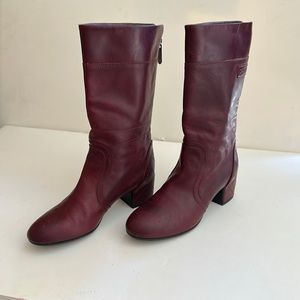 Authentic Chanel mid-calf boot with quilted heel.